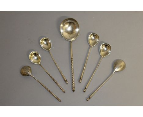 A SET OF SIX RUSSIAN ENGRAVED SPOONS with barley twist handles, stamped 84 and various dates, each 13cms long, and a larger s