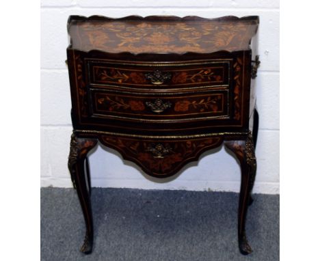 A DUTCH MARQUETRY COMMODE.