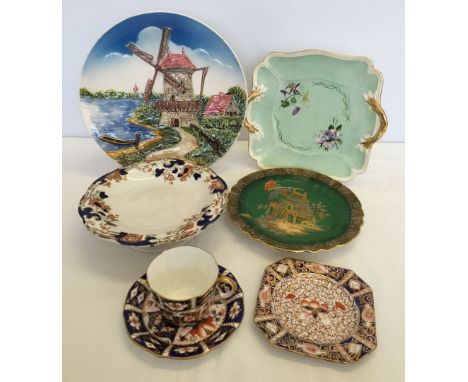 A selection of ceramic items to include a Crown Derby cup & saucer, Carlton ware & Wedgwood plates.