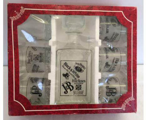 A boxed set of Jack Daniels 6 glasses and matching decanter.