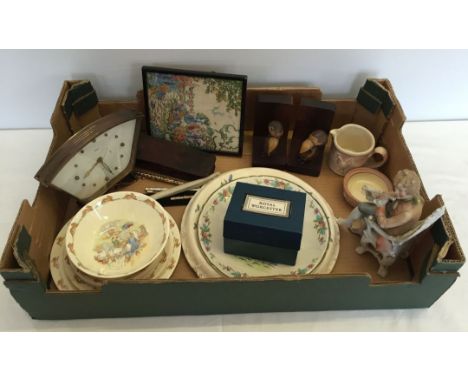 A box of mixed items to include ceramics, a Smiths clock and Bunnykins china.
