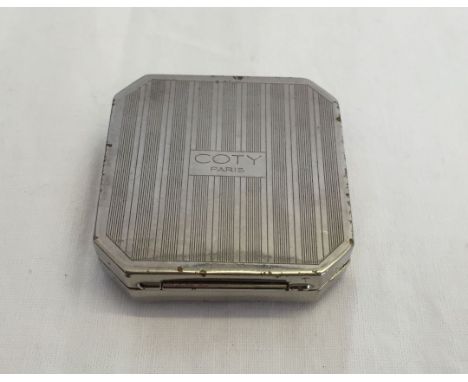 A vintage Coty of Paris double sided compact.