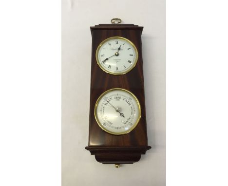 A modern combined clock and barometer.