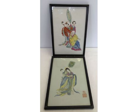 2 ceramic Chinese tiles with hand painted characters - framed 38 x 25cm.