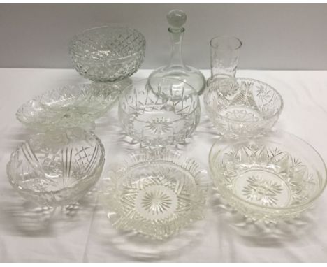 A quantity of glass bowls, dishes and a decanter.
