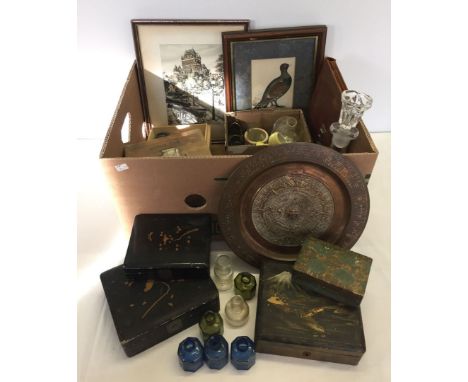 A box of assorted items to include a glass decanter & bottles, oriental boxes, 2 coloured prints, leather blotter, brass Azte