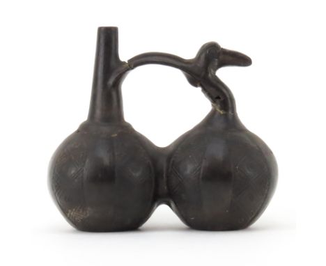Pre Columbian or Later Chimu Inca Blackware Pottery Whistling Vase. Double gourd form vase with carved patterns on surface, f