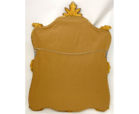 Large Decorative Giltwood Mirror. Probably Italian. Unsigned. Very good condition. Measures 50" H x 34" W. Shipping: Third pa