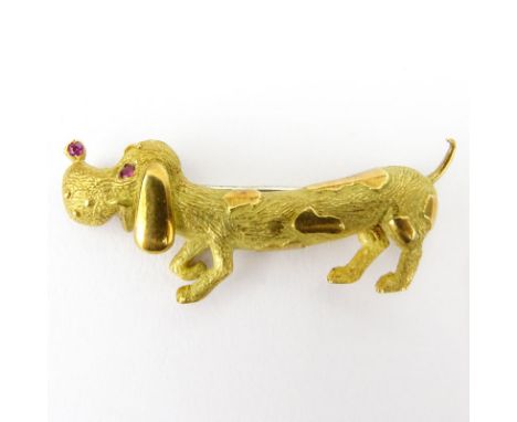 Vintage Miniature 18 Karat Yellow Gold Dog Pin with Ruby Eyes. Stamped 750. Good condition. Measures 5/8" x 1-5/8". Approx. w