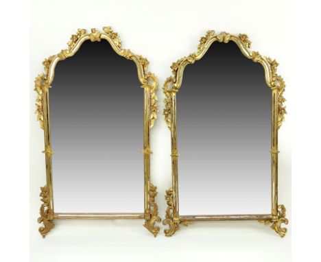 Pair of mid 20th Century Italian Carved and Giltwood Mirrors. Flower and foliage relief to frame. Both frames are in "As Is" 