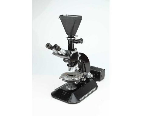 complete with KAM VBX camera and camera tube, inclined binocular body, microscope head, lamp housing, six objective turret wi