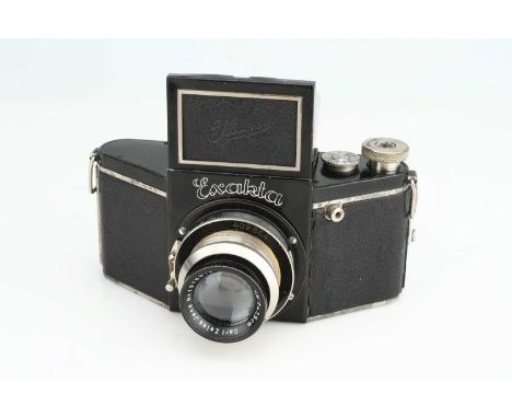 black, serial no. 402844, with Carl Zeiss Jena Tessar f/2.8 75mm lens, body, VG, shutter working, lens, VG, some light intern