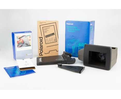 appears almost unusued, in box with instructions, also with a Polaroid Spectra / Image Close-Up Stand Duplicator, boxed, and 