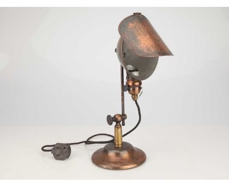 American, c.1911, cast into the iron base 'LYHNE LAMP PATD JUL 12 10 DEC 1911 U.S.A.', with articulated copper shade and adju