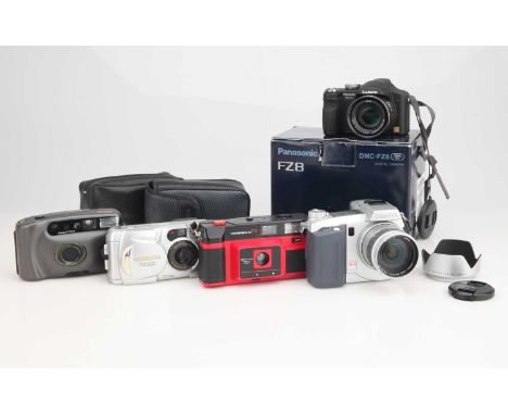 including a Pnasonic FZ8, a Minolta Dimage 7, an Olympus Digital Zoom C-900, and more,