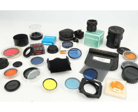 including a Lee Filters 100mm x 100mm polarizing filter, a set of extension tubes for Minolta AF lenses, a wide selection of 