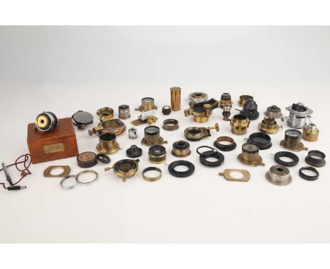 collection of various microscope substage condensers and parts, with some by R &amp; J Beck and Reichert, in various conditio