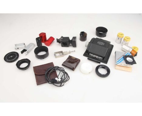including an MPP roll film back, a Watkins Time Thermometer, Zeiss Ikon reloadable cartridges, and more (a lot),