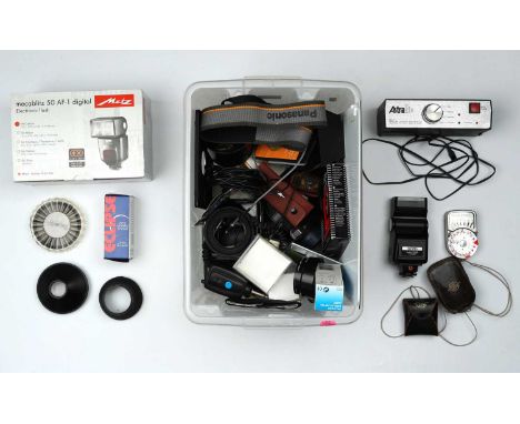 including a Mecablitz 50 AF-1 flash gun, a selection of camera filters, an Astralite unit, lens hoods, and more,