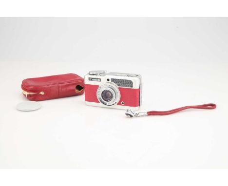 chrome and red, body G-VG, shutter working, light meter untested, optics VG-E, very slight dust present, in matching red make