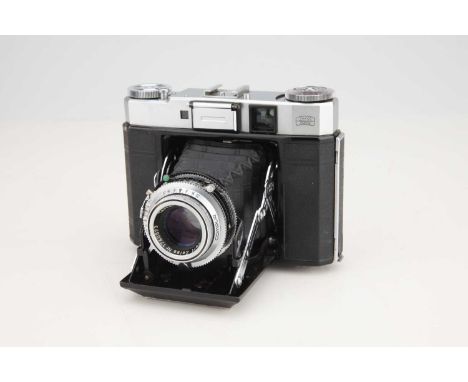 chrome, body G-VG, shutter working, bellows in G condition, some wear to corners, optics G, some light haze and some dust pre
