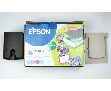 including an Epson Perfection 1650 with cables, box and power lead, and a Polaroid SprintScan 35 Plus, no cables,