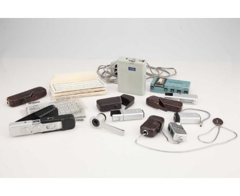 chrome, body G, shutter stuck, untested with batteries, also with a Minox Light Meter, a cased Minox Flashgun Model B, a Mino