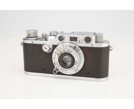 chrome, serial no. 181692, body G, shutter working, with a Leitz Elmar 50mm f/3.5 lens, optics G, some haze present