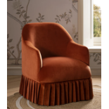 Calliope Skirted Armchair, Rust Velvet. - R8.10. RRP £369.99. Designed with beautiful sloped arms