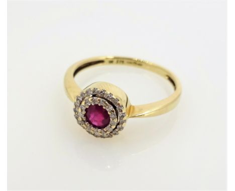 Gold ruby and diamond double halo set ring hallmarked 9ct   Condition Report  size M-N2.2gm Click here for further images, co