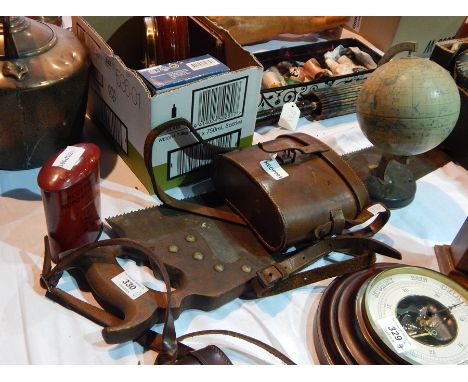 A Chad Valley tinplate piggy bank letterbox together with a Chad Valley children's globe, a pair of binoculars in leather cas