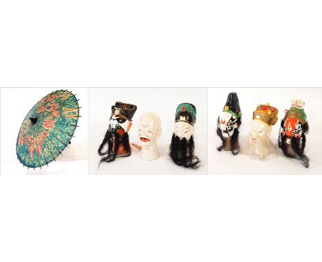 An Eastern lacquer bamboo painted sunshade together with a small collection of Chinese puppet heads 