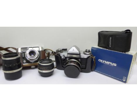 A Voightlander camera, three other cameras and two lenses