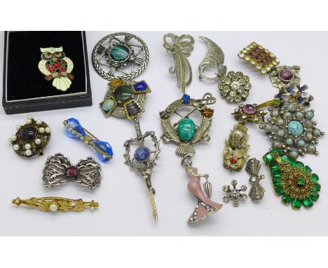 Costume brooches including Celtic, a green stone hair clip and an enamel owl brooch