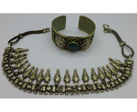 An Eastern white metal necklace and bangle