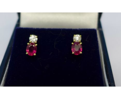 A pair of 18ct gold, diamond and ruby earrings, 3.5g, L