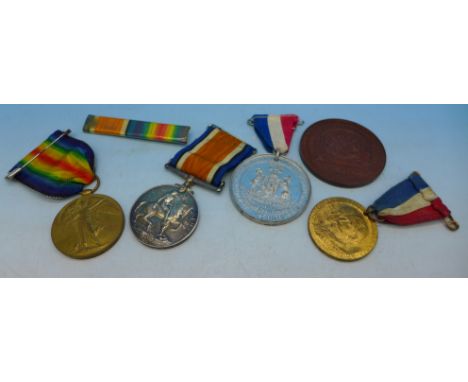 A pair of WWI medals, 80896 Pte. F. Bowerman Durham Light Infantry and three medallions