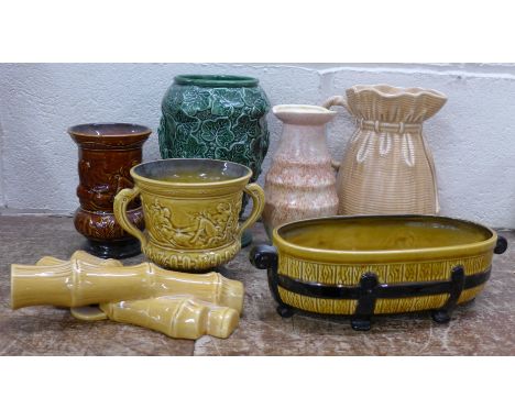 Seven items of Sylvac pottery including a bamboo wall pocket, 2652 leaf vase, 406 sack vase and others