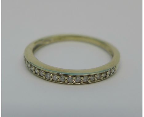 A 9ct white gold and diamond half eternity ring, 1.9g, R