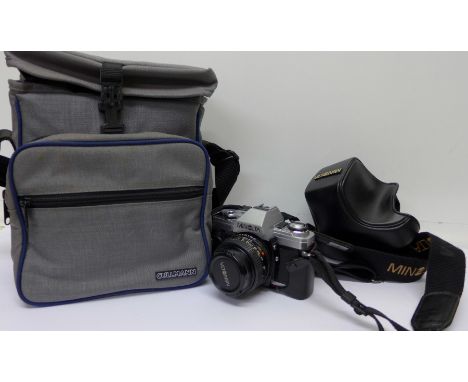 A Minolta X-300 camera with instructions and carry case