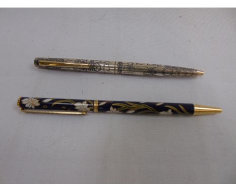 Rolex Oyster silver pen and an enamel pen