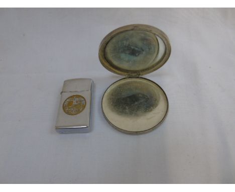 White metal compact mirror and a Zippo petrol lighter USS Simon Lake