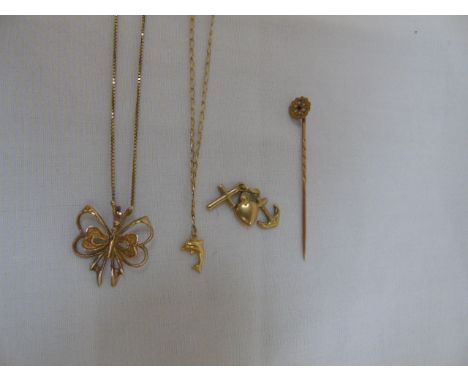 Various gold items including stone set stick pin, butterfly brooch on chain total weight approx 6.8gms