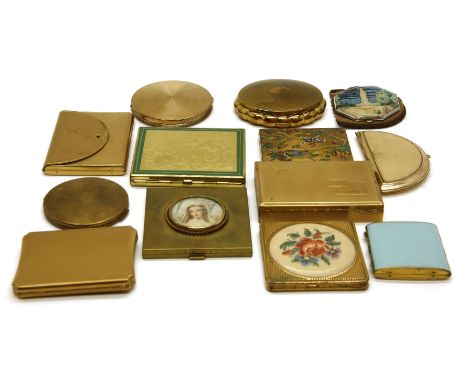 A collection of gilt and yellow metal vintage compacts to include enamelled examples, Kigu, Vogue, Coty, Stratton, and a coll