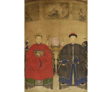 A large Chinese ancestor portrait painting,early 20th century, of an elderly couple seated on armchairs in front of an altar 