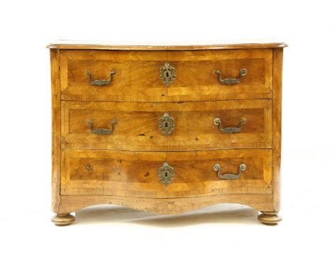 A Swiss walnut serpentine commode, with three feather banded drawers, 114cm wide, 63cm deep, 83.5cm high