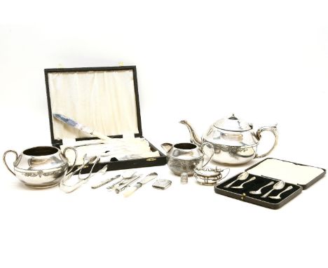 A collection of silver items, including vesta case, thimble, pepper and salt, with plated sugar tongs, fruit knifes and forks