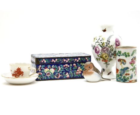 A pair of Meissen teacup and saucers, each decorated with a red dragon, together with Goebel birds, a similar Royal Copenhage