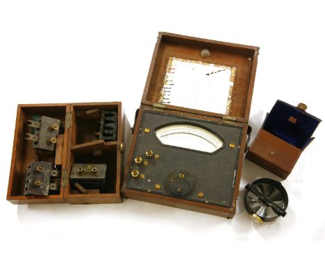 An Ower low speed anemometer by Short and Mason, cased, three boxed electricity multipliers, and a volt meter