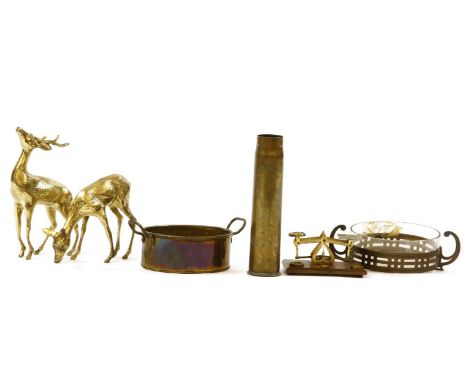 A large quantity of brass ornaments, copper wares, etc, to include vases, postal scales, etc